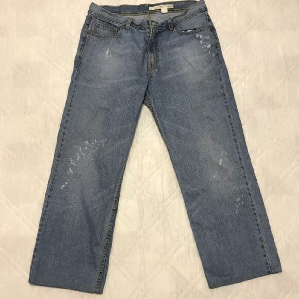 Distressed DKNY blue jeans 34X27